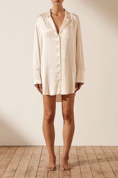 Elegant Cream Shirt Dress For Daywear, Neutral Long Sleeve Shirt Dress For Daywear, Elegant Cream Long Sleeve Shirt Dress, Elegant Long Sleeve Cream Shirt Dress, Elegant Relaxed Fit Dress For Loungewear, Chic Long Sleeve Neutral Shirt Dress, Long Sleeve Silk Loungewear Dress, Long Sleeve Silk Dress For Loungewear, Silk Long Sleeve Loungewear Dress