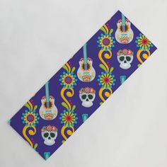 a colorful tie with skulls and guitars on it's blue backgroung