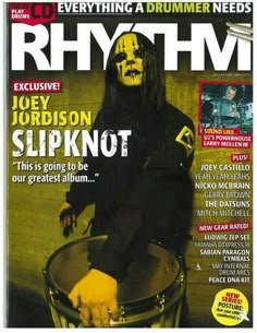 a magazine cover with an image of a drummer