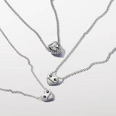 Keep eternal bonds close with our Forever & Always Splittable Heart Collier Necklaces. Crafted in sterling silver, each of the polished heart-shaped pendants are placed on an individual necklace and feature the sweet engravings "Forever" and "Always," symbolizing enduring love. The unique design allows the pendants to slide freely on the chain, while not being completely detachable. Perfect for gifting to someone special or wearing them altogether, these necklaces are a timeless expression of ev Silver Heart Pendant Necklace For Remembrance, Nickel-free Double Heart Keepsake Necklace, Personalized Silver Heart Necklace For Memorial, Valentine's Day Silver Heart-cut Necklace, Nickel-free Silver Heart Necklace For Memorials, Pearl Diamond Jewelry, Custom Charm Bracelet, Heart Promise Rings, Pandora Necklace