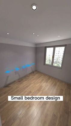 an empty room with wood floors and blue text on the wall that says small bedroom design