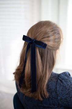 Dainty velvet hair bow for women or children. This bow is considered a "stacked" bow and features beautiful ribbon tails. It's the perfect accessory to add a little luxe and refined classic style to any outfit. Available in short and long length options. This bow is secured on a 3" French barrette. Approximate bow measurements:Short: 5.25" wide x 5.25" longLong: 5.25" wide x 9" long *Please note these bows are handcrafted and therefore vary slightly in size and look. Measurements are approximate Velvet Hair Bow, Holiday Hair Accessories, Trendy Bows, Long Bow, Bronde Hair, Bow Hairstyle, Velvet Hair, Blonde Brunette, Holiday Hairstyles