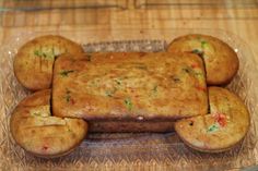 there is a cake shaped like a car made out of cookies on a glass plate