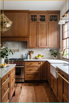 a kitchen with wooden cabinets and white counter tops, along with an area rug on the floor