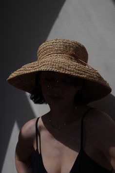 Vintage stunning straw hat with wide brim and tie accent. Favorite classic that can be worn at the beach or around town :) Can be styled with gold toned jewelry and favorite market dresses or over swim. Material not listed, assuming raffia Tag reads Kaminski Australia - Handmade in Madagascar Measures approximately: 22.5" circumference / 5" brim Some light wear to the inner head band - does not affect the overall look or wear. If you would like additional info or images prior to final sale purch Raffia Sun Hat, Helen Kaminski, Raffia Hat, Photoshoot Concept, Wide Brimmed Hats, Outfits With Hats, Wide Brimmed, How To Look Classy, Straw Hat