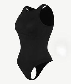 Introducing our "Curve-Contouring Halter Bodysuit" – a fashion-forward masterpiece designed to effortlessly sculpt your curves. This sleek shapewear bodysuit provides gentle compression for a refined, flawless appearance that accentuates your innate allure. Its versatile adjustable halter top and comfortable fit make it your ultimate fashion companion, ensuring you radiate confidence and elegance wherever life takes you. Product Details: Eco-Friendly Blend: 50% Recycled Nylon, 40% Nylon, 10% Spa Elegant High Stretch Bodysuit With Built-in Bra, Elegant High Stretch Leotard With Built-in Bra, Elegant Seamless Backless Bodysuit, Elegant Solid Color Sculpting Bodysuit, Elegant Sculpting Solid Bodysuit, High Stretch Smoothing One-piece Bodysuit, Elegant Bodysuit With Medium Bust Support, Elegant Underbust Bodysuit With Medium Bust Support, Elegant Seamless Leotard