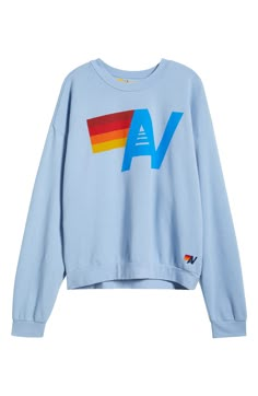 A bold logo adds a striking splash of color to this supersoft sweatshirt in a perfectly relaxed fit. 26" length (size Medium) Crewneck 50% polyester, 38% cotton, 12% rayon Machine wash, line dry Made in the USA Aviator Nation Sweatshirt, Preppy School Clothes, Preppy Sweatshirts, Bold Logo, Normal Clothes