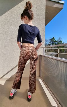 Very good vintage quality Dolce & Gabbana animal print pants. Very unique.  For your reference, model wears size XS-S, is 177 cm tall and 53 kg weight. For her pants fits perfectly. Stretch Wide Leg Leopard Print Pants, Stretch Leopard Print Wide Leg Bottoms, Stretch Wide Leg Leopard Print Bottoms, Fitted High-waist Leopard Print Bottoms, Fitted High Waist Leopard Print Bottoms, Chic Leopard Print Straight Leg Bottoms, Chic Straight Leg Leopard Print Pants, Fitted High Waist Leopard Print Pants, High Waist Leopard Print Bottoms For Fall