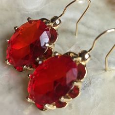 Listing Is For A Pair Of Earrings With The Gemstone: Ruby. Each Stone Is Approx 7.5 Carats. It Is Translucent, Bright, And Beautiful. The Size Is 18x13. The Gemstones Are Natural, And Originates In Mozambique. Other Features: Optic Character: Dr Refractive Index: 1.77 Specific Gravity: 3.99 These Ruby Are Certified. They Are Un-Enhanced And All Natural. Please Review Photos For Style, Measurements, And Color. Ask Questions Prior To Purchase, As There Are No Returns. This 14k Gold Filled Drop Dow Classic Red Earrings For Party, Classic Red Party Earrings, Red Classic Jewelry With Matching Earrings, Classic Red Jewelry With Matching Earrings, Formal Red Ruby Earrings, Red Crystal Earrings For Anniversary, Red Pierced Earrings For Formal Occasions, Red Jewelry With Earrings For Evening, Red Formal Pierced Earrings