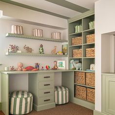 a child's playroom with green and white striped stools, bookshelves and shelves