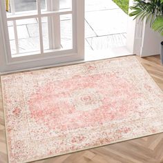 an area rug is shown in front of a door