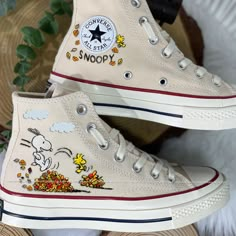 🌿 Love Embroidered Converse 🌿 ❤️ About Our Products: Each pair of shoes from our store is brand new and hand-embroidered to order. Please ensure you select the correct shoe size before checkout. The embroidery is durable and won't fade over time. ✨ Personal Expression: Showcase your unique style with custom embroidery! Contact me to create your own embroidered shoes with a private listing. I'll send you the design for approval before embroidering the shoes. Alternatively, you can design your patterns based on the shoe's plain spaces and send me a photo. 📏 Size & Color: Each listing includes a size and color chart. Follow the instructions to choose the best size for you. The size chart is standard. Note: Refer to the size guide in each listing to choose the appropriate size for your Conv Snoopy Converse, Fall Converse, Snoopy Shoes, Custom Baby Shoes, Custom Converse Shoes, Converse Design