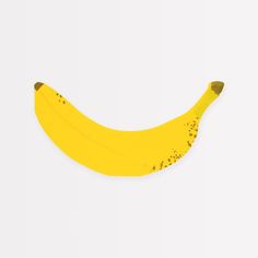 an image of a banana cut out on the wall with paint splattered over it