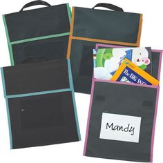 three different colored bags with name tags on the front and back, each containing books