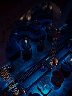 an aerial view of a room with blue lighting