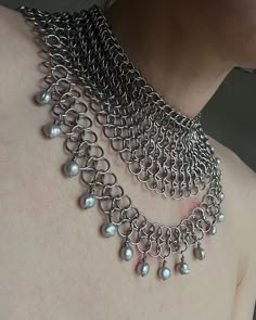 ARMOR 01 NECKLACE surgical steel / grey freshwater pearls min length: 33cm max length: 42cm PLN 480 / €110 This piece is unique (1of1) and won’t be recreated DM to buy 💌 Chainmail Hand Jewelry, Chainmail Necklace Patterns, Chain Maille Armor, Armor Jewelry, Medieval Revival, Jewerly Ring, Chainmail Necklace, Chainmaille Jewelry