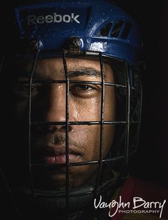 a man with a hockey helmet on his head