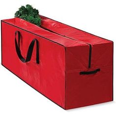 a large red bag with a plant in it