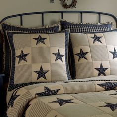 a bed with blue and white stars on it