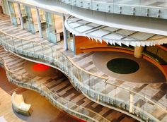 the inside of a building with stairs leading up to it