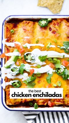 the best chicken enchiladas in a casserole dish with tortilla chips