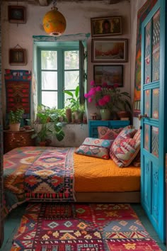 a bedroom with colorful rugs and plants in the window sill above the bed