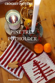 crochet pattern pine tree potholder with gingerbread cookies and candles on the table