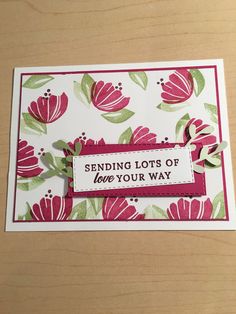 a close up of a card with flowers on it and the words sending lots of love your way