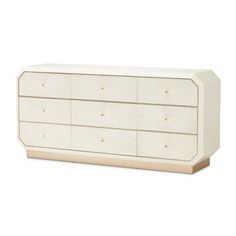 an image of a white dresser with drawers