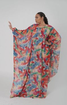 Kaftan made with chiffon crepe  fabric.  Fabric does not stretch.  Can be worn as a beach cover up.  Polyester  Care Instructions: Machine Wash and Air Dry or Dry Clean only. Bohemian Flowy Georgette Maxi Dress, Flowy Bohemian Georgette Maxi Dress, Summer Georgette Tunic Kaftan, Bohemian Multicolor Georgette Maxi Dress, Multicolor Printed Chiffon Maxi Dress, Bohemian Multicolor Maxi Chiffon Dress, Flowy Multicolor Tunic Cover-up, Multicolor Chiffon Maxi Dress, Flowy Bohemian Chiffon Beach Dress