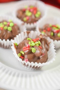 chocolate candy with sprinkles on a white plate