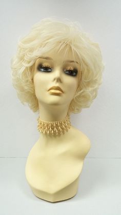 "An elegant and classy short style with lots of curl and volume. Made with heat resistant synthetic fibers (up to 320F degrees) which retain its style even after cleaning and can be styled with heating tools. Color: Blonde (613) Style: Short, Curly Circumference: Default at 21\" with adjustable cap (max 22\") Materials: Heat Resistant Synthetic Wig Fibers All sales are final. Please read all store policies before purchasing." Curly Short Wig, Fluffy Wig, Curly Short, Curly Bob Wigs, Blonde Bombshell, Blonde Wig, Short Wigs, Light Blonde, Wig Styles