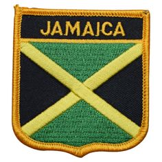 a jamaica flag patch with the word jamaica in gold and green on it's side