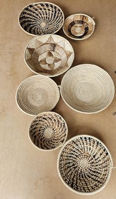 several baskets are arranged in the shape of circles