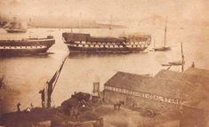 an old photo of several ships in the water