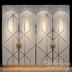 an art deco room divider in gold and white