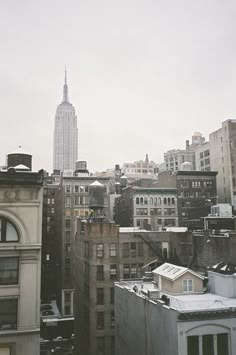 a view of the empire state building from an upper floor apartment in new york city