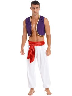 a man in a purple shirt and white pants is posing for the camera with his hands on his hips