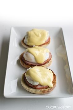 eggs benedict on english muffins with hollandaise sauce