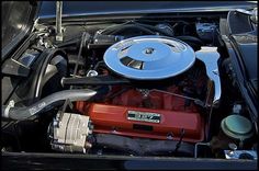 the engine compartment of an older model car