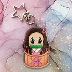 DESCRIPTION * Nezuko keychain, character from the anime and manga Kimetsu no Yaiba / Demon Slayer  * Same illustration on both sides  * 5.5 cm high * Illustrated by me and professionally produced!  Remember! Final product colors may be a bit different and it doesn't contain a watermark   SHIPPING  * All shipments are made by ordinary shipping, if you want a secure shipment with a code, make sure to check the "with tracking code" option when purchasing. Without tracking is more economic but if it can get lost I can't locate it ☆ Nezuko Keychain, Anime And Manga, Kimetsu No Yaiba, Demon Slayer, Keychains, Beauty Book, Accessory Gift, Pet Supplies, Paper Party Supplies