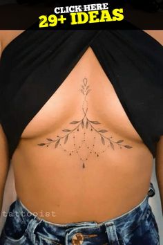 the back of a woman's stomach with tattoos on it