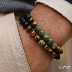 Personalized Mens Gemstone Bracelets set for Protection,Grounding and Energy, Onyx, Tiger Eye and Jasper,Gift for boyfriend,Couples bracelet    Looking for a unique and stylish accessory that also offers some powerful benefits? Check out our personalized men's douple bracelets, made with matte black onyx, tiger eye and Jasper gemstones. Each bracelet is carefully crafted and customized to fit the wearer's wrist size, and comes in a beautiful wooden box with custom engraving. Black onyx is a powerful stone that promotes strength, focus, and self-confidence. Tiger eye is believed to bring good luck and protection. Jasper stone provides benefits such as supporting inner strength, balancing energy, promoting emotional tranquility, and enhancing mental clarity. It is also associated with ground Manly Bracelets, Mens Bracelet Beads, Stone Bracelet For Men, Mens Beaded Bracelet, Beads For Men, Men’s Bracelet Designs, Men Bracelet Design, Men Beaded Bracelet, Bracelet Man