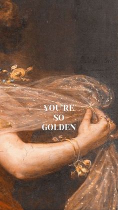 a painting with the words, you're so golden on it and a woman holding flowers