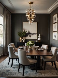 a dining room table with chairs and a chandelier