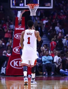 a basketball player is standing on the court