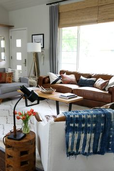 a living room filled with lots of furniture