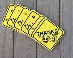 three yellow tags that say thank, thanks and for building memories with me on them