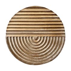 a circular wooden object with wavy lines on it