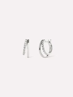 For all of our silver savants out there, we made you these dainty double hoop earrings. These sterling silver huggie hoops feature two rings—one sleek, one littered with sparkling cubic zirconia gems. Wear these double hoop earrings with other silver jewelry. If you’re straying away from silver, our Toda earrings also come in gold! • Sterling silver huggie hoops • Set with cubic zirconia gems • 365-day warranty Title tag Double Hoop Earrings - Toda Silver | Ana Luisa Jewelry Badge 16217 reviews Widget Customer Reviews Based on 16217 reviews Write a review 81% (13200) 10% (1565) 4% (694) 2% (355) 2% (403) J J.L. So chic Some of my favorite earrings I own now! I can wear these for any occasion. T T.Y. Best Daily Earrings Absolutely love these. I've worn them every day for the last 6 months a Dainty Silver Earrings Aesthetic, Silver Earrings Hoop, Cute Silver Earrings, Daily Earrings, Simple Silver Earrings, Sliver Earrings, Silver Jewlery, Double Hoop Earrings